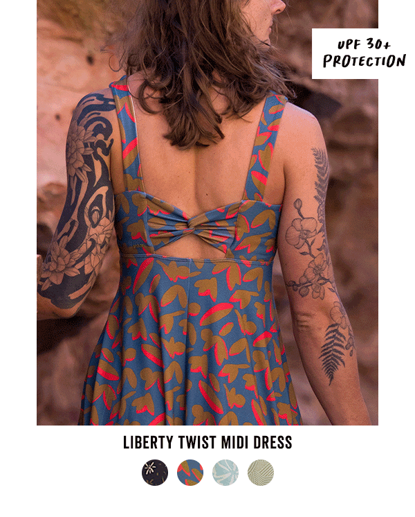 Shop the Liberty Twist Midi Dress >